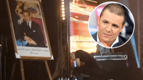 الشاب فضيل يركع أمام صورة محمد السادس ويفتخر بمغربيته!