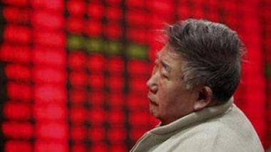 China falls into budget deficit as spending balloons