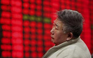 China falls into budget deficit as spending balloons