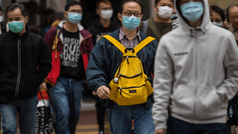 بكين تلغي إجبارية ارتداء الكمامات