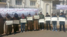 لجنة المطالبين بعمل تهدد بالخروج إلى الشارع