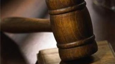 A Canadian lawyer gets  5-year prison term along with his Manager for swindling