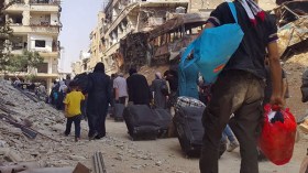 البدء بإجلاء سكان مدينة داريا السورية المحاصرة