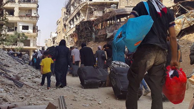 البدء بإجلاء سكان مدينة داريا السورية المحاصرة