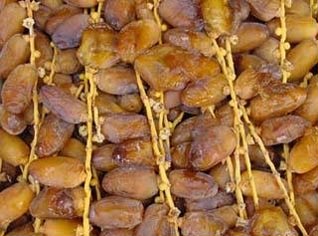 Traffickers smuggle Algerian dates and sell them at low prices on global market