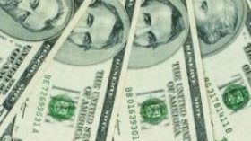 Algerian Dinar devalued against the US Dollar
