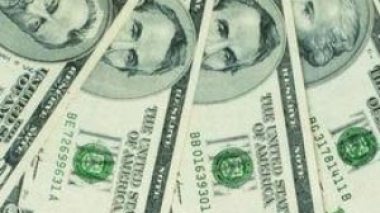 Algerian Dinar devalued against the US Dollar