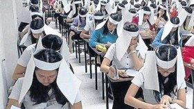 جامعة تايلاندية تستخدم قبعات “مضادة للغش”