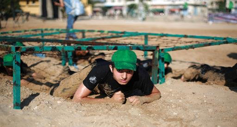 Dans les camps d'été à Ghaza, on mime la guerre