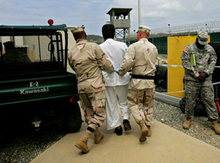 Algerian delegation deals with 2 Guantanamo released Algerian detainees