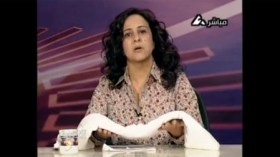 إعلامية تظهر بالكفن وفضائية تصف مرسي “بالمريض نفسيا”!