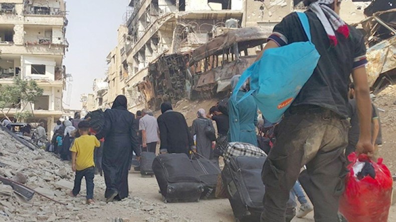 إجلاء مقاتلي المعارضة السورية وعائلاتهم من حلب