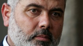 هنية يمنح الفلسطينيين العائدين من سوريا شقة سكنية ووظيفة