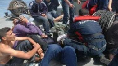 Coast guards chase illegal immigrants in Algeria