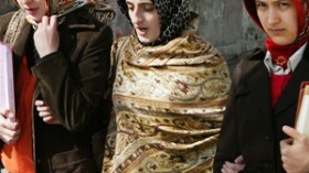 زرهوني لم يتكلم إطلاقا عن نزع الخمار وحلق اللحية