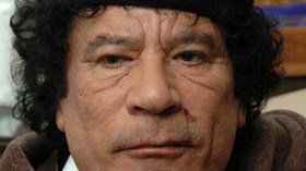 القذافي في زيارة “تاريخية” إلى إيطاليا