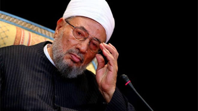 القرضاوي يحرم الاستجابة لدعوات السيسي بالتظاهر الجمعة