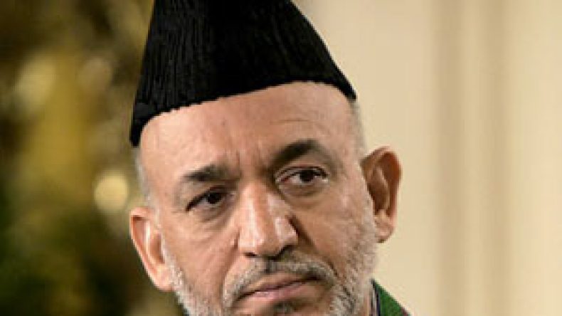 كرزاي: “تلقينا أكياسا من المال من إيران”