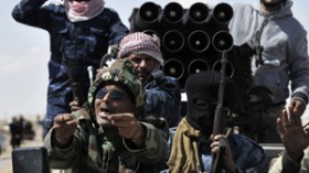 عناصر من الاستخبارات الأمريكية في ليبيا لاسقاط القذافي