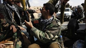 تكتل دولي يبحث سبل تمويل المعارضة الليبية المسلحة بروما