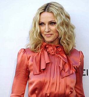 Madonna sparkles on her 50th birthday party