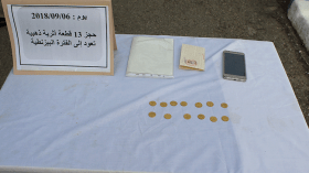 توقيف 3 أشخاص يتاجرون بـ 13 قطعة نقدية أثرية ذهبية بميلة