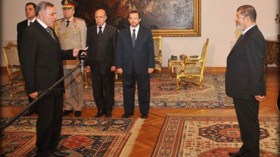 الوزراء الجدد بحكومة قنديل الثانية يؤدون اليمين الدستورية