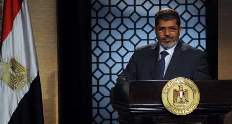 Le président égyptien Mohamed Morsi appelle au “changement” à Damas