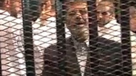 مرسي يغيب لسوء الأحول الجوية والمحكمة تؤجل الجلسة