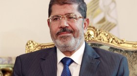 الرئيس المعزول محمد مرسي يصل إلى أكاديمية الشرطة للمحاكمة