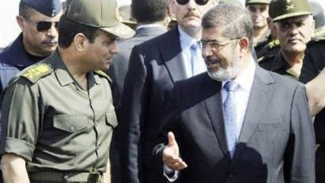 بالفيديو.. مرسي يصف السيسي بالمخبول والمهووس