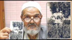 مجاهد يجوب ارجاء الوطن بصور رفيقه الشهيد بحثا عن عائلته