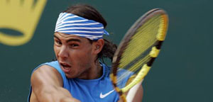 Nadal hopes it will be third time lucky in soggy Paris