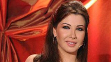 Nancy and Kathem arrive in private planes