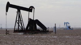 Easing Gustav concern, strong dollar push oil down
