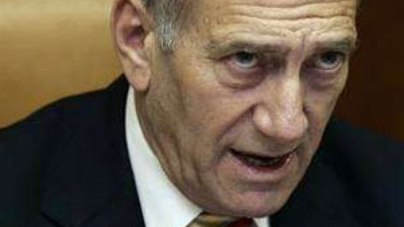 اولمرت يهدد بإقالة وزراء العمل اذا وافقوا على حل البرلمان