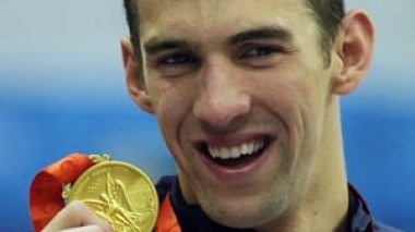 Olympic swimming legend Phelps apologises after being pictured smoking a drug pipe