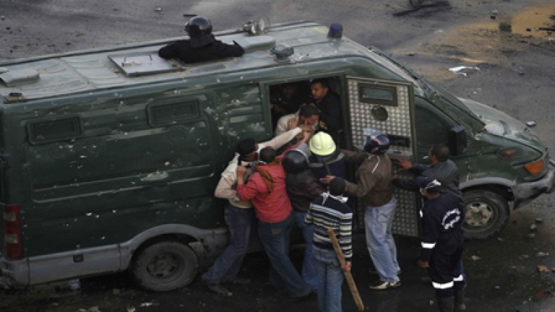 Egyptian police jailed in absentia over uprising deaths