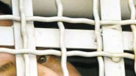 7 سجناء جزائريين بليبيا بينهم سجينتان يدخلون في غيبوبة