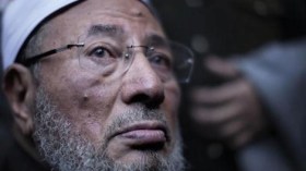 القرضاوي: عزل مرسي حرام وهو خروج مسلح عن الشرعية