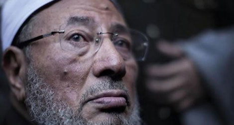 Al-Qaradaoui: “Renverser Morsi est un acte illégitime”