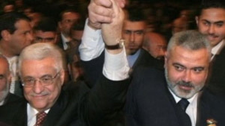 عباس ومشعل يشددان على طي صفحة الإنقسام الفلسطيني