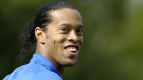 Ronaldinho completes $30 million transfer to AC Milan