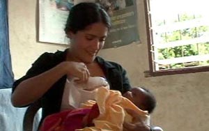 Salma Hayek breast-feeds sick African baby