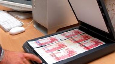 France arrests 12 people for faking Algerian money