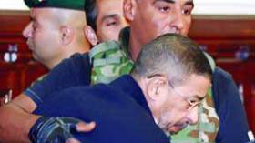 محكمة تونسية تبريء مدير الامن الرئاسي السابق لبن علي