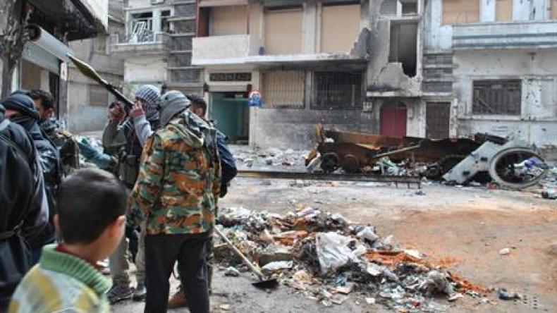 Syrian forces shell rebel city, block aid