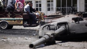 Syrian Troops, Rebels Clash in Northern City