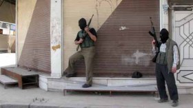 As Syrian Government Claims Pullout, Activists Report Attacks