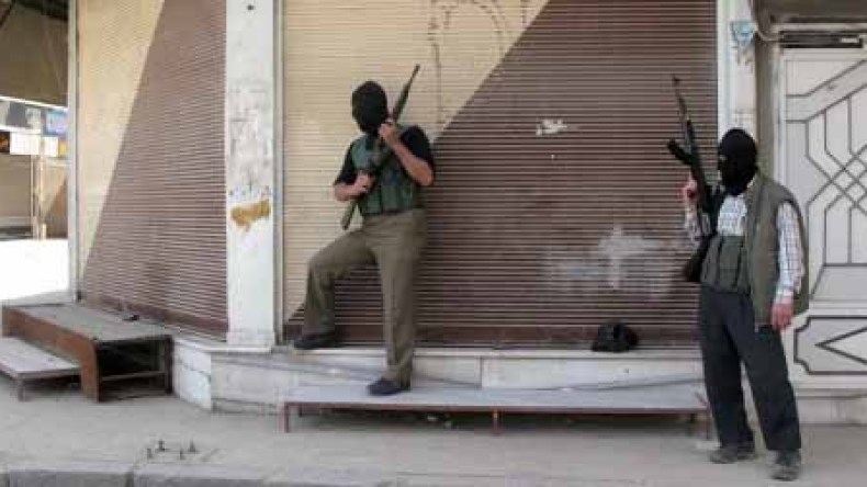 As Syrian Government Claims Pullout, Activists Report Attacks